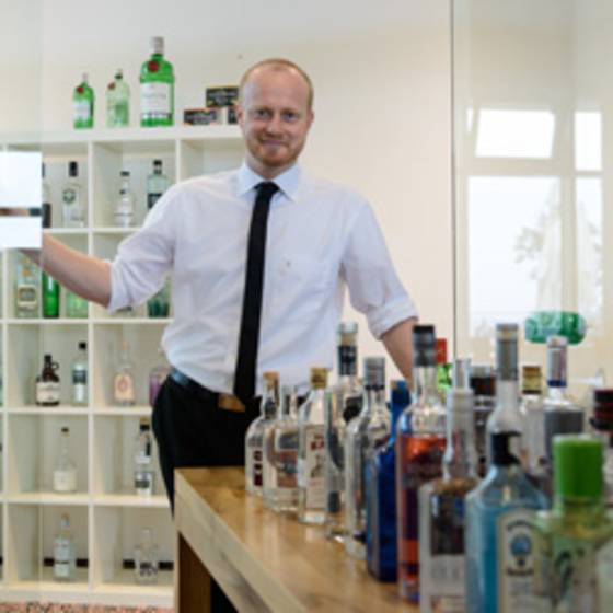 Stefan, the owner of the largest gin bar in Styria