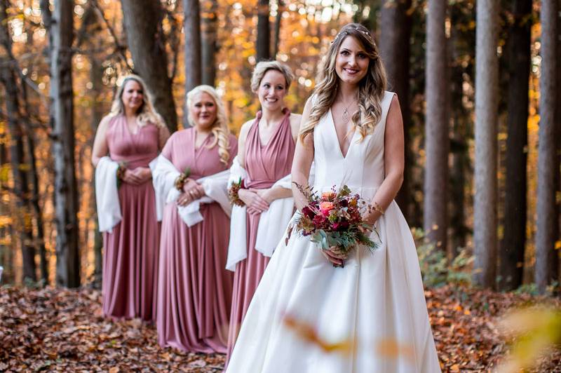 Bride with her bridesmaids - forest wedding in hotel Liebmann in Styria